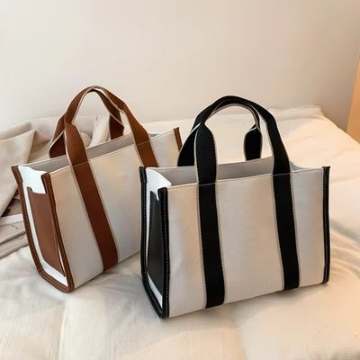 Hauptmaterial PU GHJ-31 Handtaschen für Frauen mit Bewegungserkennung und gestreiftem Design