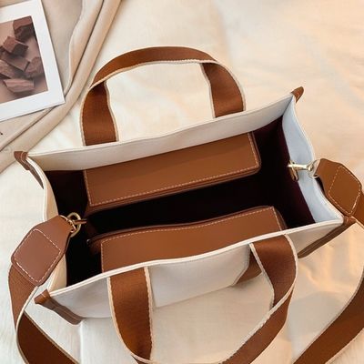 Hauptmaterial PU GHJ-31 Handtaschen für Frauen mit Bewegungserkennung und gestreiftem Design