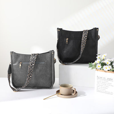 Leopard-Druck Veganer Leder-Damen-Schultertasche mit Gitarrenriemen und Einzelgriff