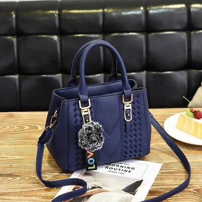 Elegante Schultertasche aus echtem Leder mit Zeichentrickmuster und Knopfdekoration