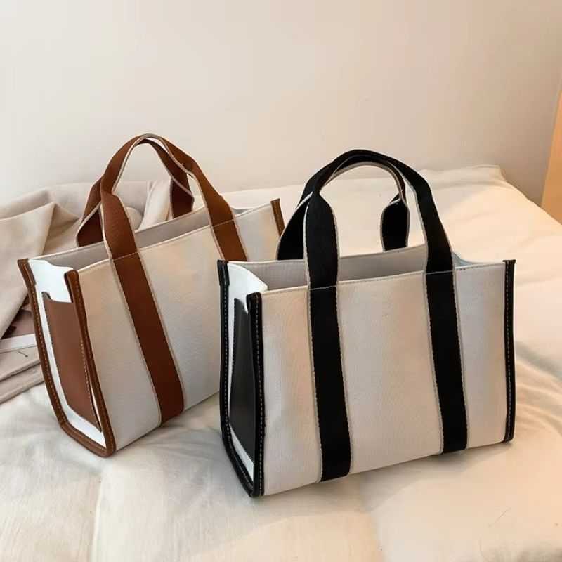 Hauptmaterial PU GHJ-31 Handtaschen für Frauen mit Bewegungserkennung und gestreiftem Design